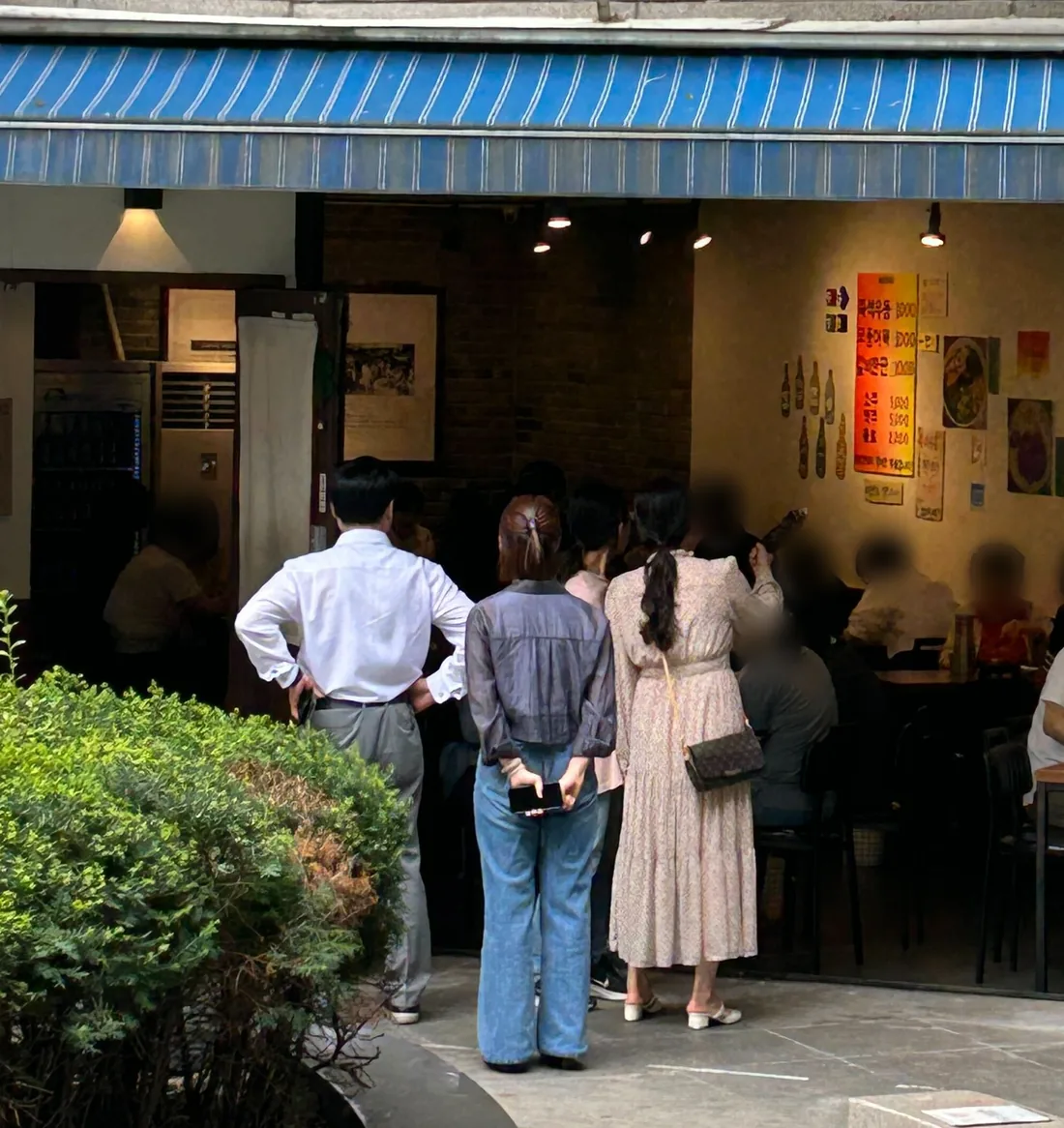 Customers waiting at the door of Woobool Restaurant, Songpa, Seoul